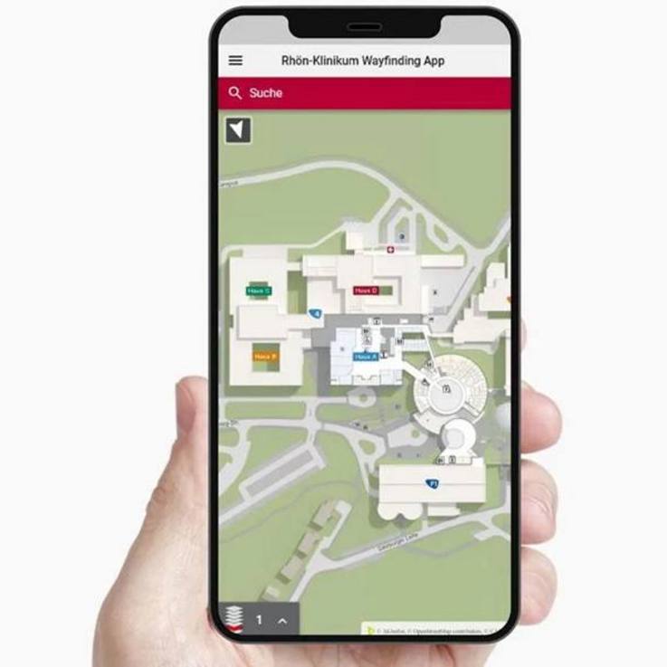 Bildschirm Mobiltelefon mit App Lageplan Gebäude zur Orientierung für die Besucher - das 3D-Berlin-Wegeleitsystem